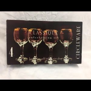 Set of 4-Gold-rimmed wine glasses by Circleware.
